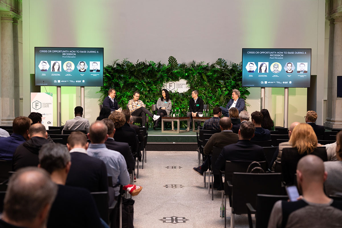 Panel discussion with audience and monitors 